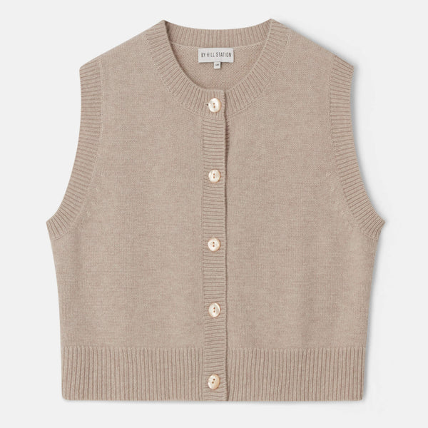 Jen Sand- a round neck mother of pearl vest